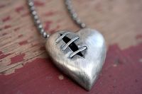 sterling silver sutured heart necklace front view