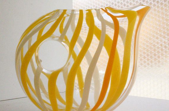 a beautiful handblown glass pitcher to use however you like
